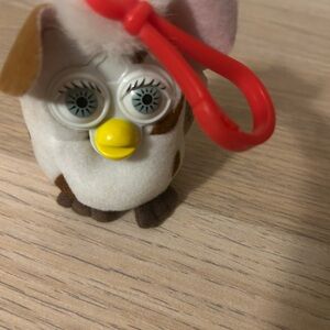 Vintage 2000 Furby McDonald’s Red and Brown perfect bag accessory.